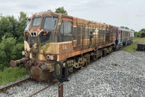141 class loco 152 waits by the West Crossover so the railbus can get through the shed.
