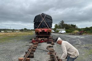Winding the clock back just over 24 hours, and here's Bob Twigg crawling through briars and nettles to help dismantle the loading ramp.