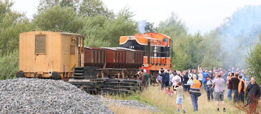 Preserved 121 class loco hauling a ballast train at a diesel gala.