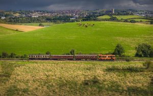 Now running bonnet first, locomotive 124 trundles through the Downpatrick countryside.